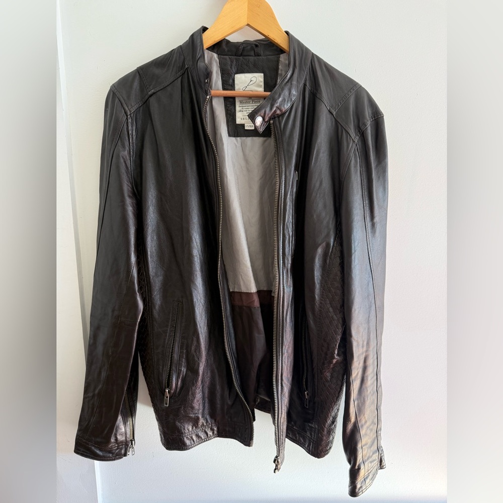 Leather jacket in chocolate brown with weave side detail